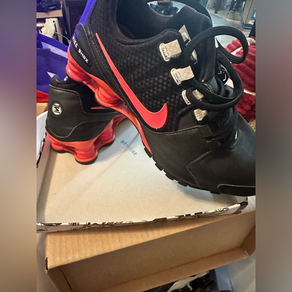 Nike Women’s Black Sneakers with Red Accents
